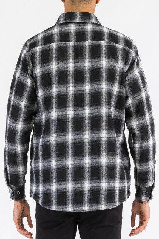 Rear view of a blue black plaid shirt men with a classic flannel design by WEIV