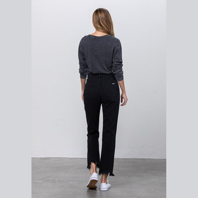 Back view of women's edgy straight leg jeans by Insane Gene with a stylish frayed hem