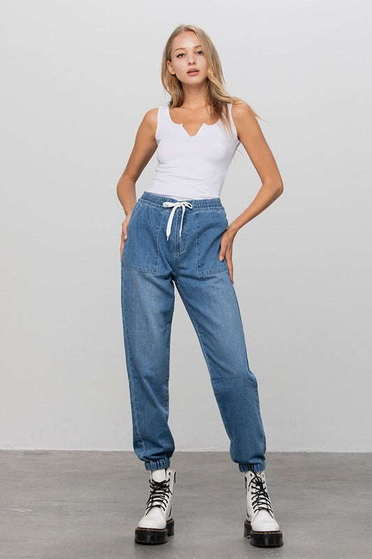 Insane Gene Women's Jeans in Light Blue, travel worthy for your next vacation with a relaxed fit and drawstring waistband