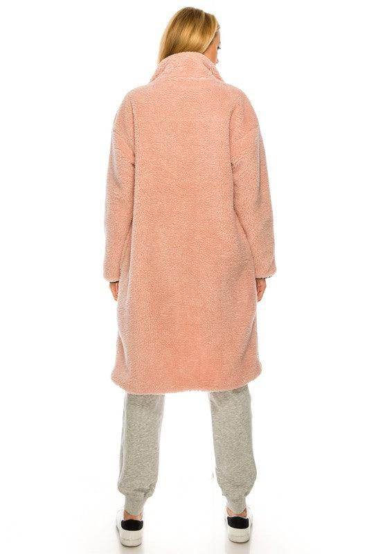 Back view of a long pink fleece coat for women, perfect for cozy winter layering by Andante USA