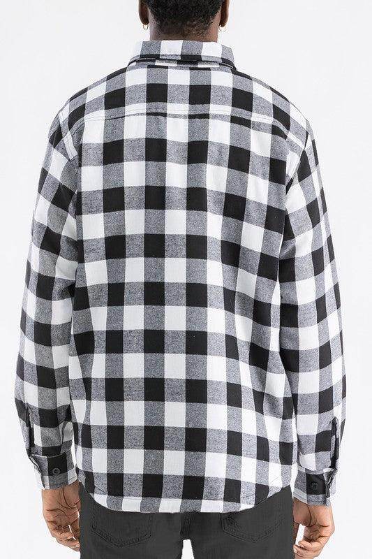Back view of WEIV padded flannel jacket for men in black and white checkered pattern