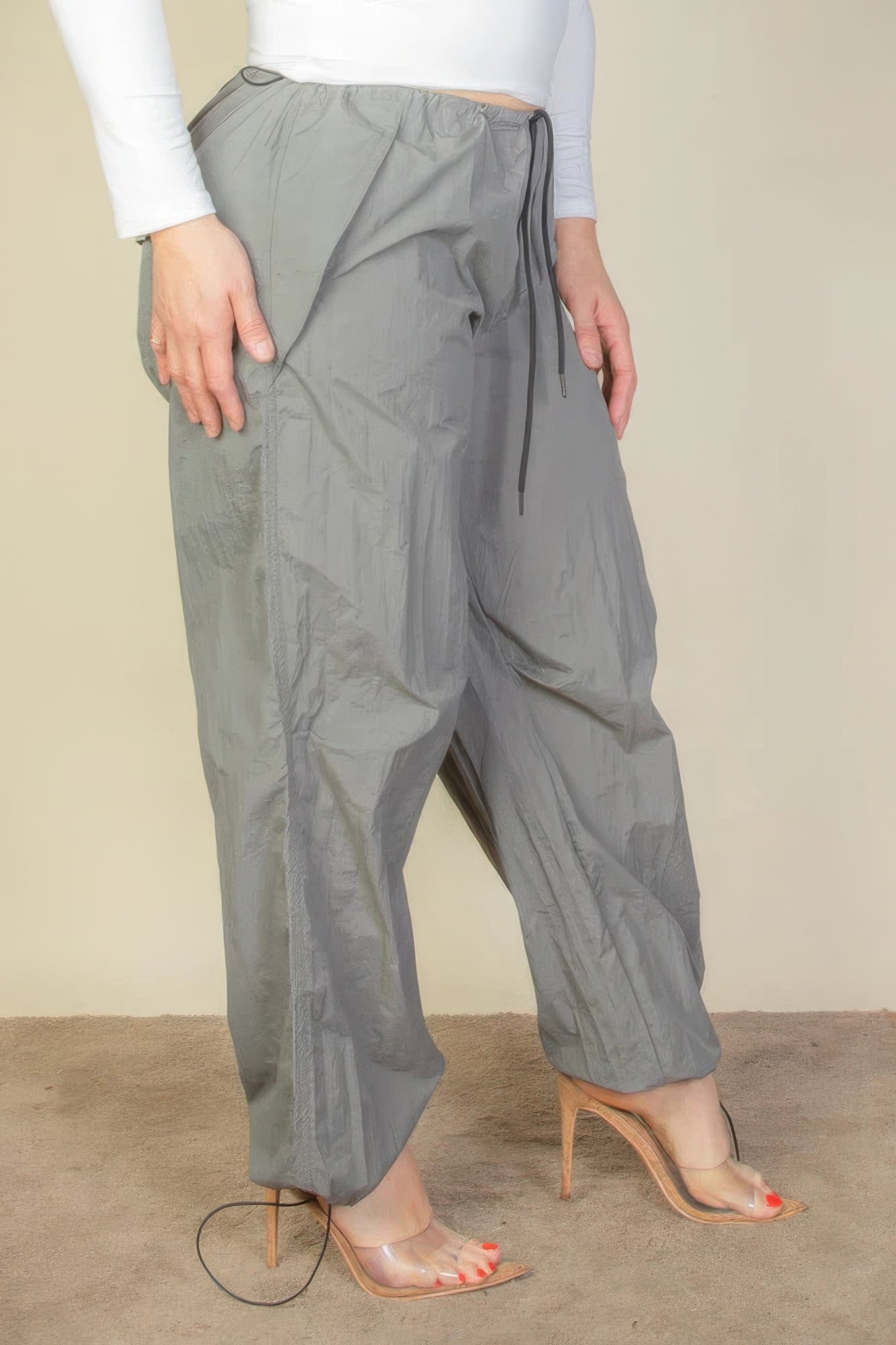 Plus size parachute pants for women in gray with adjustable waistband and relaxed fit