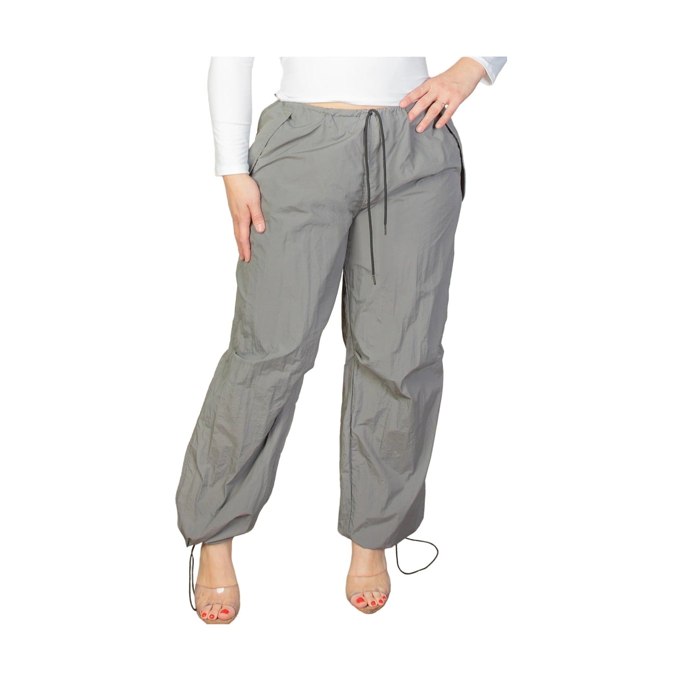 Women wearing plus size parachute pants for women in gray, ideal for casual and comfortable wear