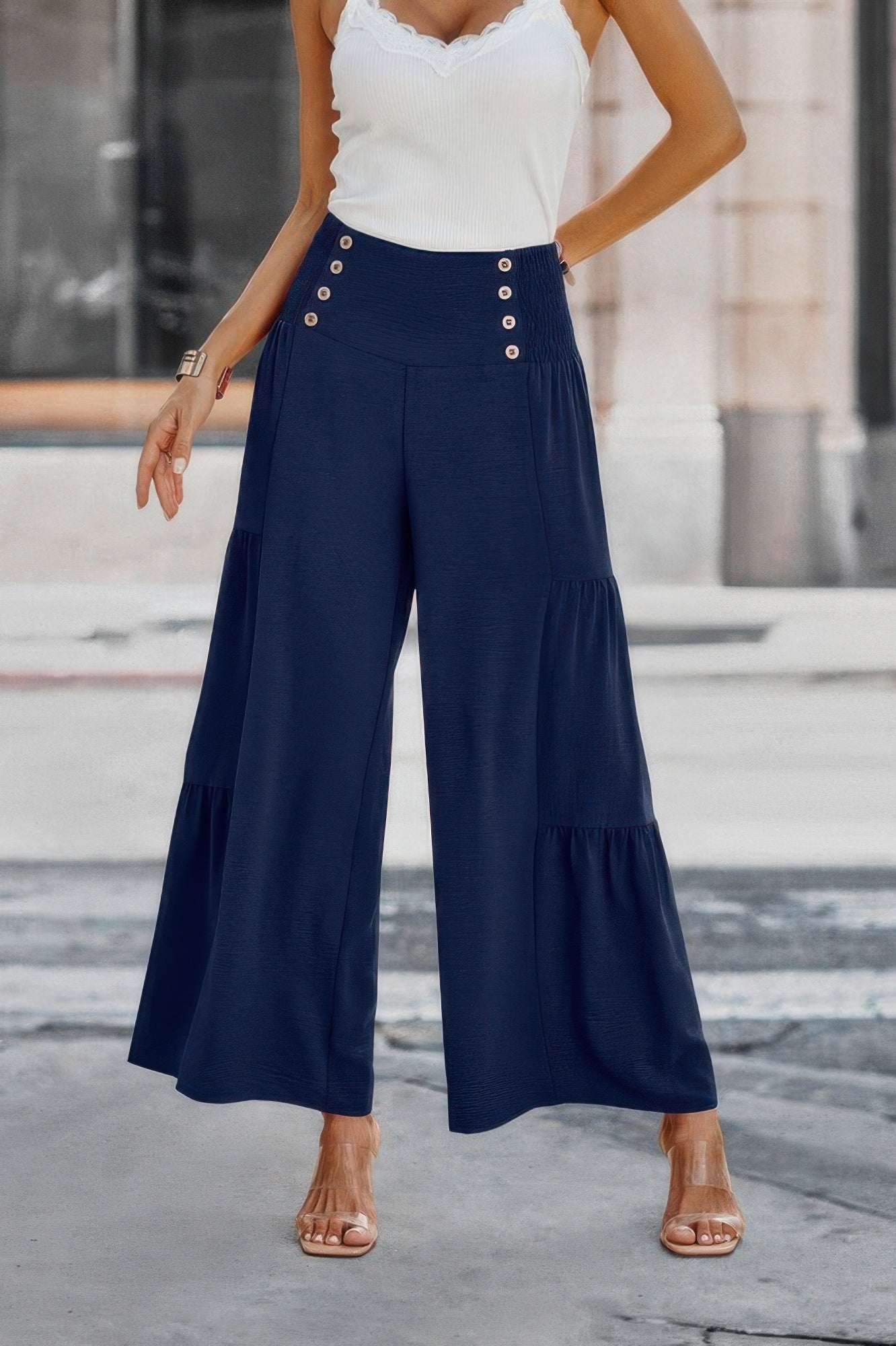 Navy solid button wide leg trousers for women featuring stylish button details and flowing fabric