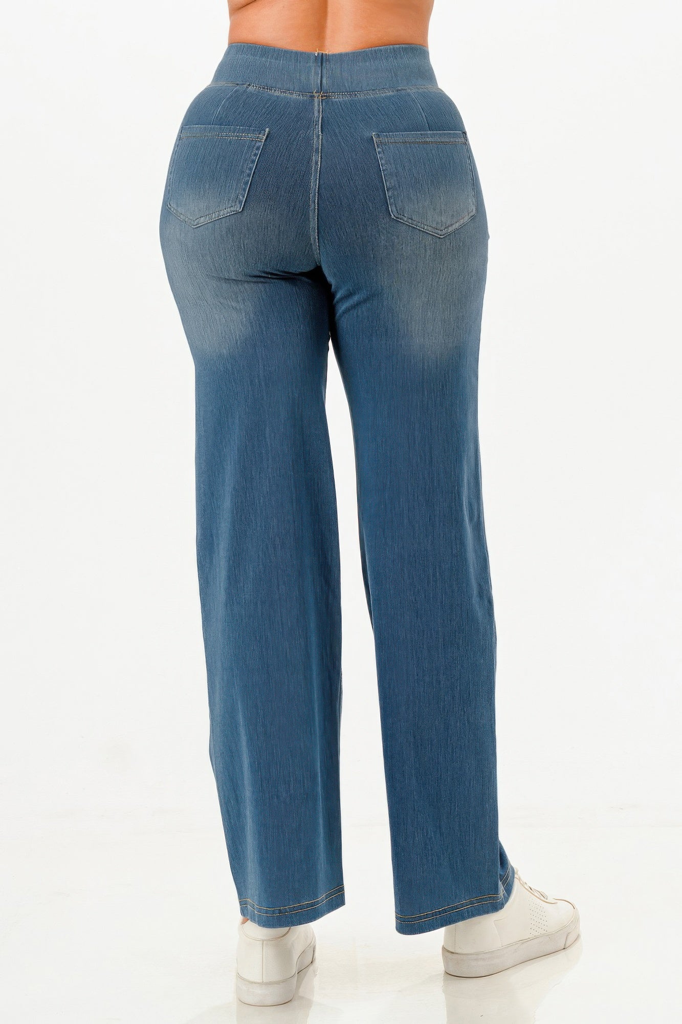 Back view of Women's ultra soft flare baggy jeans in light blue denim for ultimate comfort